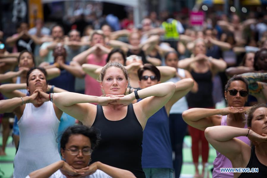 U.S.-NEW YORK-TIMES SQUARE-YOGA