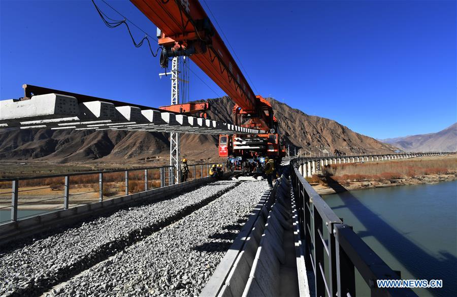 CHINA-TIBET-LHASA-NYINGCHI RAILWAY-BRIDGE-RAIL LAYING-COMPLETION (CN)