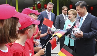 Xi, Merkel launch Panda garden in Berlin zoo