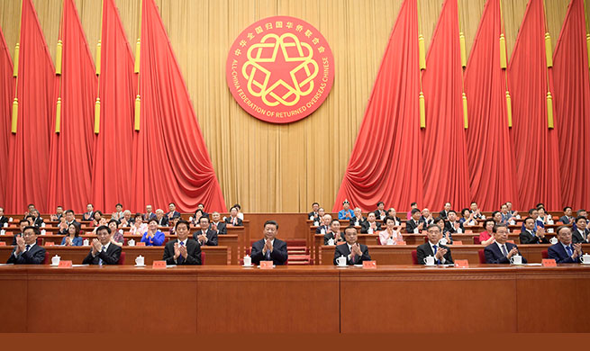 Top leaders attend congress of returned overseas Chinese